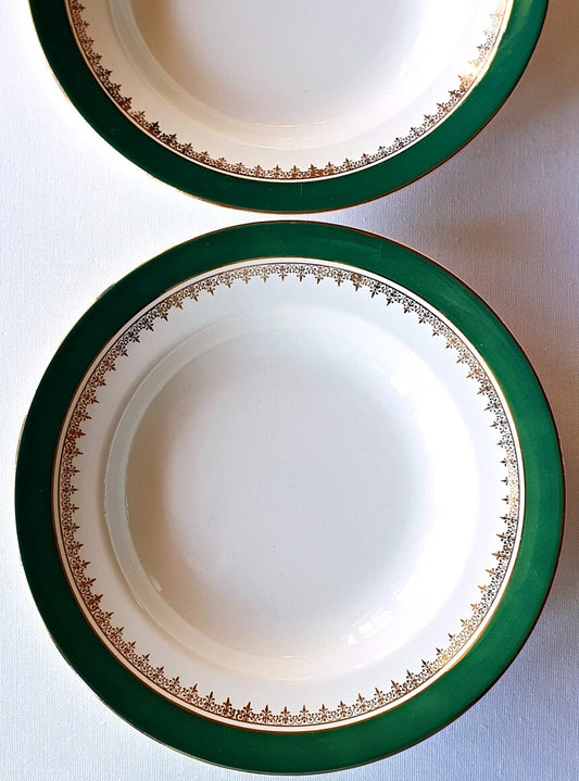 Picture of deep green colored with siver rim vintage plates from Digoin-Sarreguemines, 'Martine' series