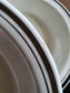 picture of a detail from edge saide of gien vintage dark gray deep plate
