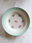 picture of mint flowers print french vintage deep plate on a rustic table