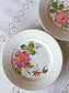 picture of a french vintage pink cosmos print plate from saint-amand on the white embroidered kitchen cloth