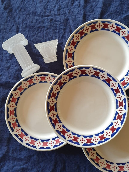 picture of same design french vintage dessert plates with blue and red brown colors