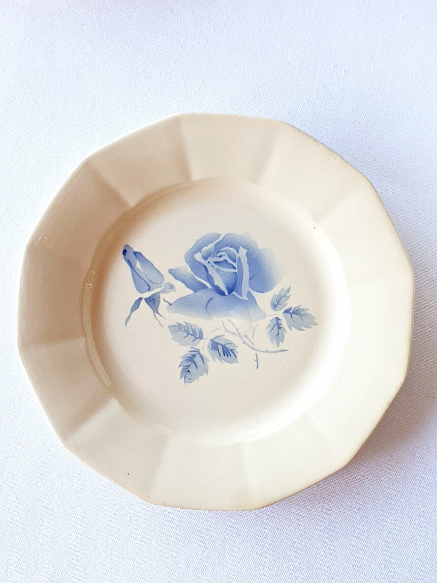picture of a vintage dinner plate with blue roses from Digoin-Sarreguemines