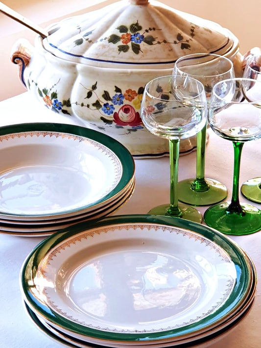 Picture of deep green colored with siver rim vintage plates from Digoin-Sarreguemines, 'Martine' series with green wine glass and a tureen backside