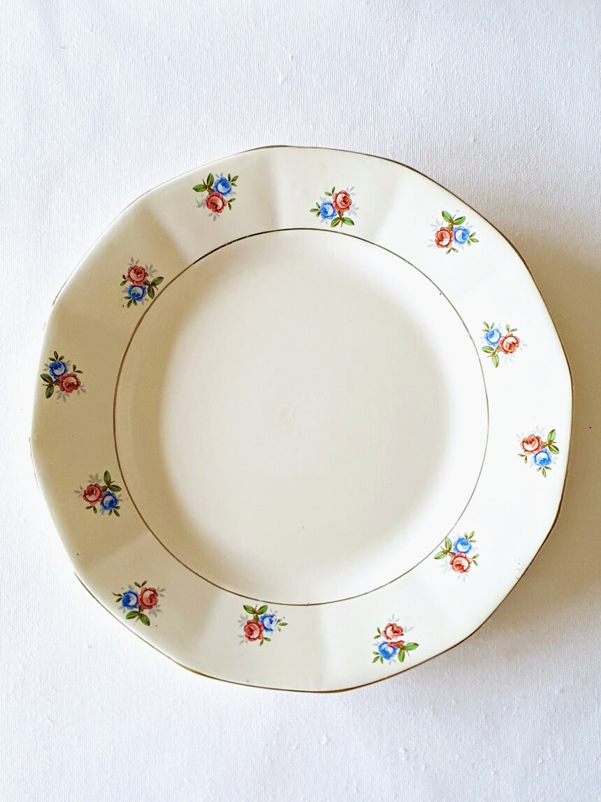 picture of flower pattern french vintage plate on white color kitchen cloth