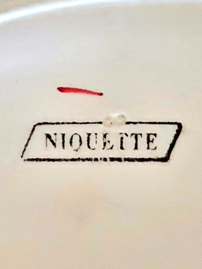 picture of a pink line with logo of 'Niquette' from Digoin sarreguemines