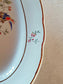 picture of a detail of edge saide of french vintage pickle dish