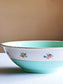 picture of mint color vintage salad bowl from french lunéville with brass candle holder backside