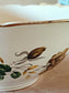 picture of vintage salad bowl with gold brown rose and gold ring edge