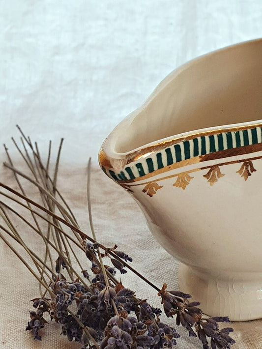 picture of frontside of green and gold stripe sauce boat from digoin sarreguemines france with lavenders