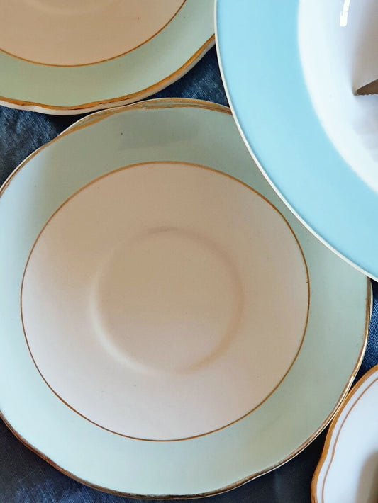 picture of mint colored saucer plate with gold frame