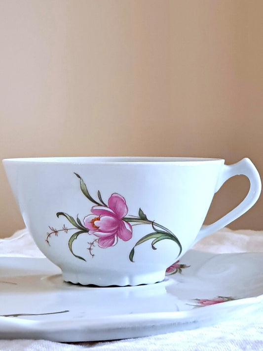 picture of a pink flower porcelain tea cup from Couleuvre, french manufactory