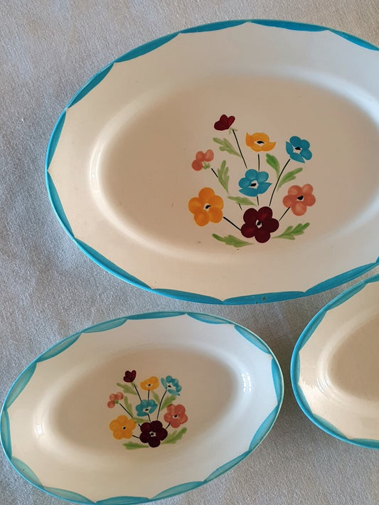 picture of light blue color oval shaped serving dishes from french vintage pottery salin les bains